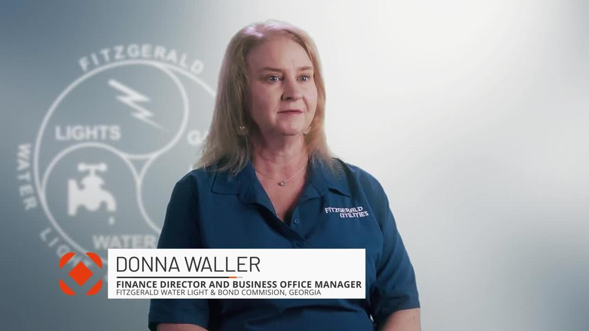 Screengrab of a customer testimonial video featuring Donna Waller, Finance Director and Business Office Manager at Fitzgerald Water, Light and Bond Commission, GA.